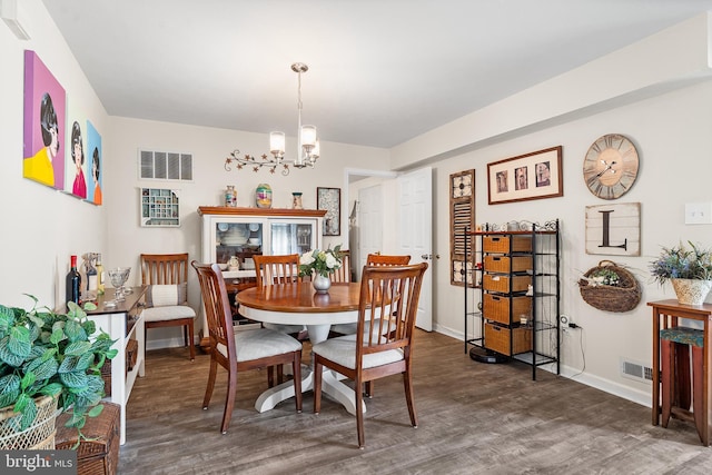 9 Peppergrass Dr N, Mount Laurel, NJ 08054 - dining space with wood finished floors, a chandelier, and baseboards