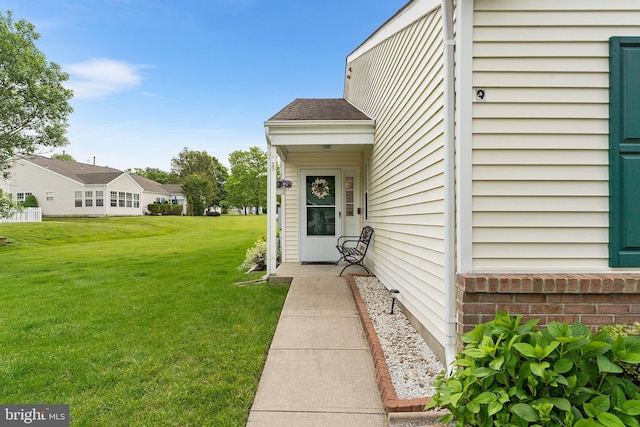 9 Peppergrass Dr N, Mount Laurel, NJ 08054 - doorway to property featuring a lawn and a shingled roof