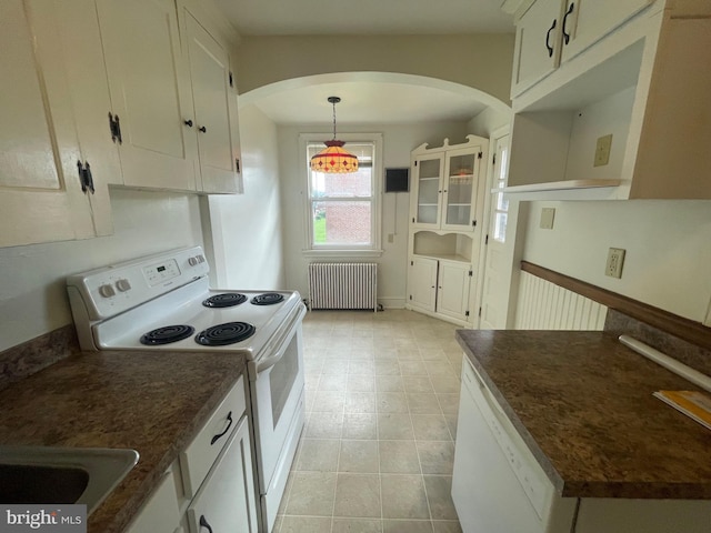 kitchen featuring radiator, white electric range, arched walkways, white cabinetry, and pendant lighting