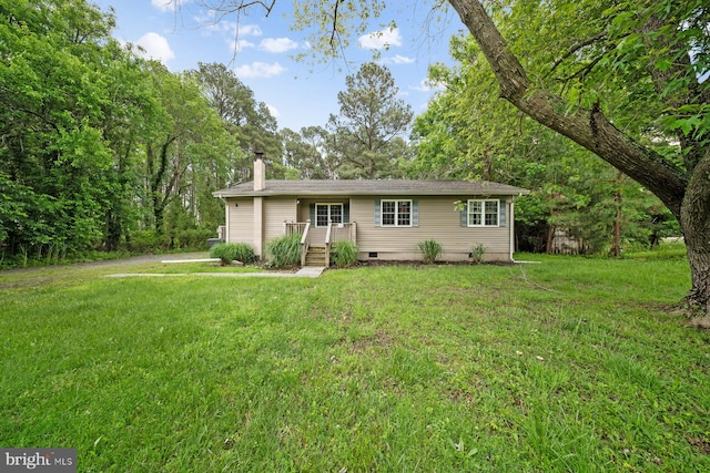 1211 Mcglaughlin Rd, Fishing Creek, MD 21634 - ranch-style home with a chimney, a front yard, and crawl space