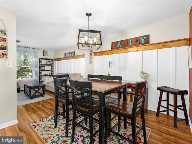 2524 Vineyard Ln, Crofton, MD 21114 - dining area with wood finished floors, a chandelier, and baseboards