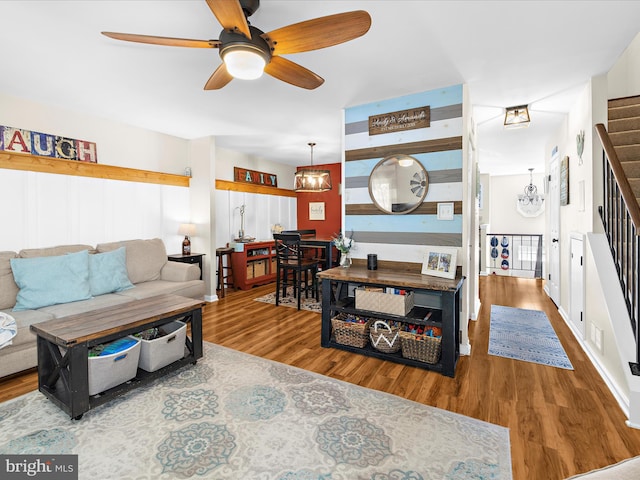 2524 Vineyard Ln, Crofton, MD 21114 - living area with stairway, a ceiling fan, and wood finished floors