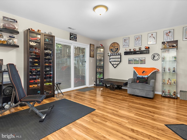 2524 Vineyard Ln, Crofton, MD 21114 - workout area featuring wood finished floors and baseboards