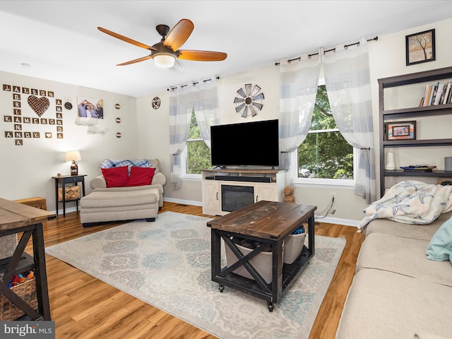 2524 Vineyard Ln, Crofton, MD 21114 - living room featuring plenty of natural light, wood finished floors, ceiling fan, and baseboards