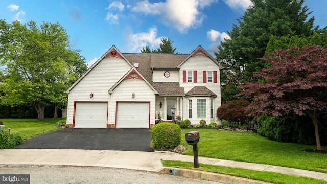 705 Hemlock Ct, Hanover, PA 17331 - view of front of house featuring asphalt driveway, a shingled roof, and a front lawn