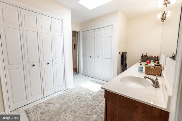 705 Hemlock Ct, Hanover, PA 17331 - full bath featuring a skylight, a closet, and double vanity