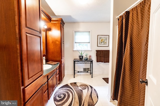 705 Hemlock Ct, Hanover, PA 17331 - full bath with vanity, tile patterned floors, and curtained shower