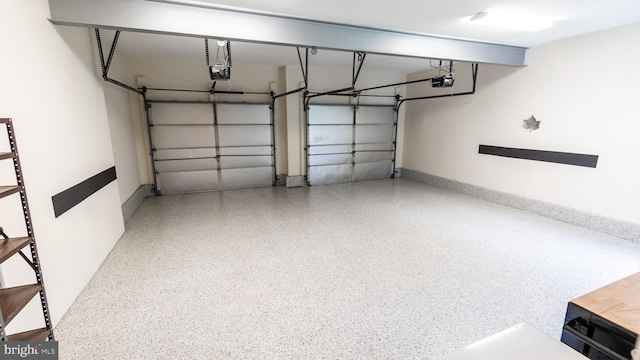 705 Hemlock Ct, Hanover, PA 17331 - garage with a garage door opener and baseboards