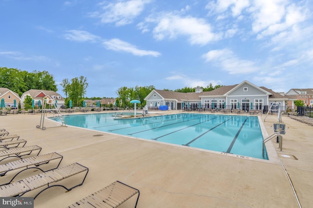 5223 Calvada Ct, White Plains, MD 20695 - community pool featuring a patio