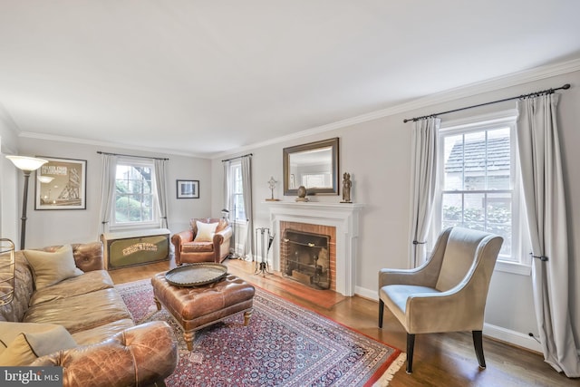4831 Alton Pl NW, Washington, DC 20016 - living area with ornamental molding, wood finished floors, a brick fireplace, and baseboards