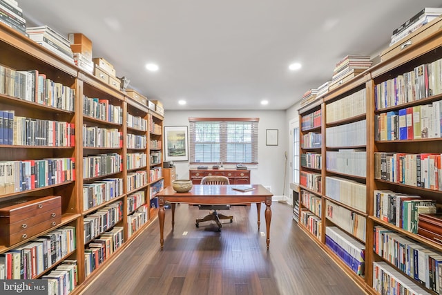 4831 Alton Pl NW, Washington, DC 20016 - office area featuring bookshelves, wood finished floors, recessed lighting, and baseboards