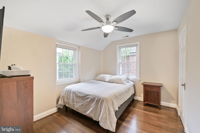4831 Alton Pl NW, Washington, DC 20016 - bedroom with vaulted ceiling, wood finished floors, baseboards, and ceiling fan