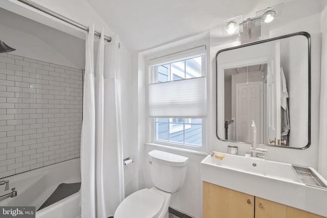 4831 Alton Pl NW, Washington, DC 20016 - full bath featuring vanity, shower / tub combo with curtain, toilet, and healthy amount of natural light