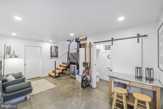4831 Alton Pl NW, Washington, DC 20016 - basement featuring recessed lighting, a barn door, stairway, and baseboards
