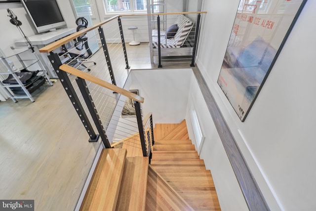 4831 Alton Pl NW, Washington, DC 20016 - stairway with wood finished floors and a towering ceiling