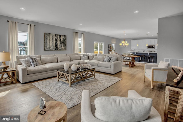 128 Fred Dr, North East, MD 21901 - living room with a chandelier, light wood finished floors, and recessed lighting