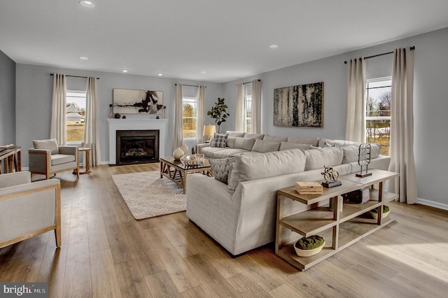 128 Fred Dr, North East, MD 21901 - living area with wood finished floors, recessed lighting, and a glass covered fireplace