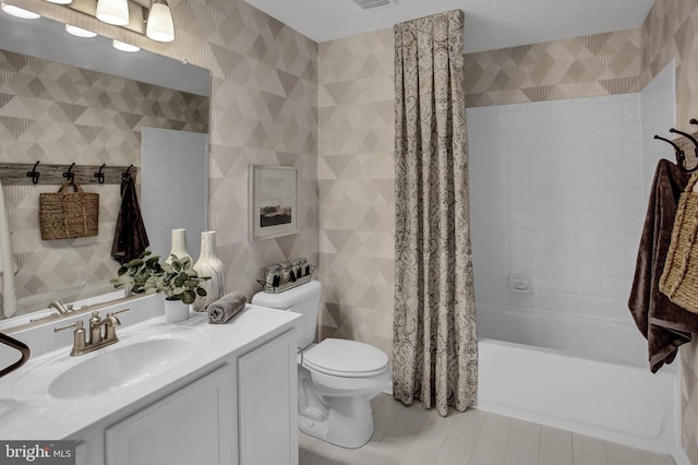 128 Fred Dr, North East, MD 21901 - bathroom featuring tile walls, tile patterned flooring, vanity, toilet, and shower / tub combo