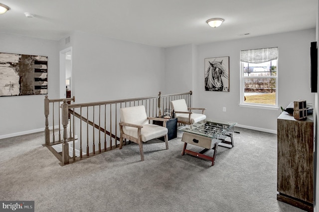 128 Fred Dr, North East, MD 21901 - living area with an upstairs landing, carpet flooring, and baseboards