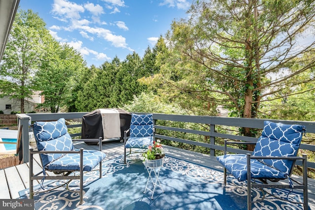 wooden terrace with grilling area