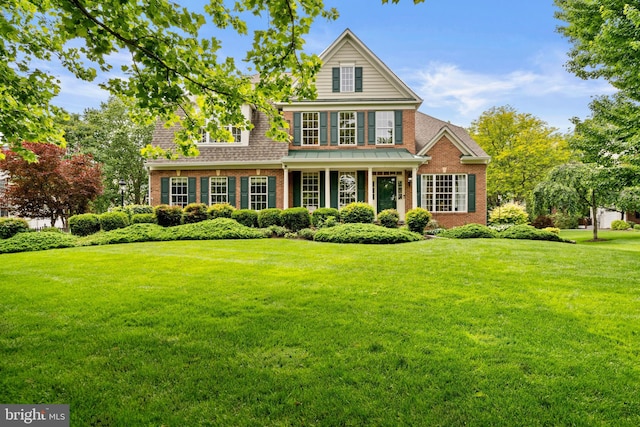 21381 Chickacoan Trail Dr, Broadlands, VA 20148 - view of front of house with brick siding and a front yard