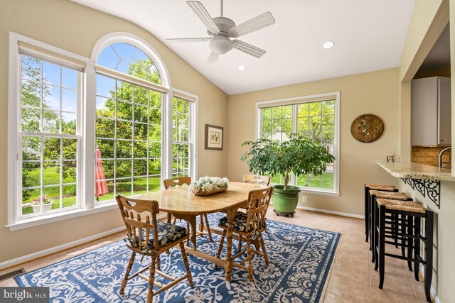21381 Chickacoan Trail Dr, Broadlands, VA 20148 - dining room featuring lofted ceiling, a ceiling fan, baseboards, light tile patterned floors, and recessed lighting