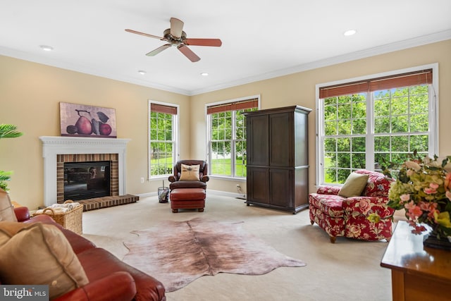 21381 Chickacoan Trail Dr, Broadlands, VA 20148 - living room featuring light colored carpet, crown molding, ceiling fan, a fireplace, and recessed lighting