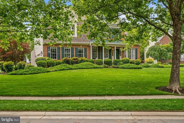 21381 Chickacoan Trail Dr, Broadlands, VA 20148 - view of front of home with brick siding and a front lawn