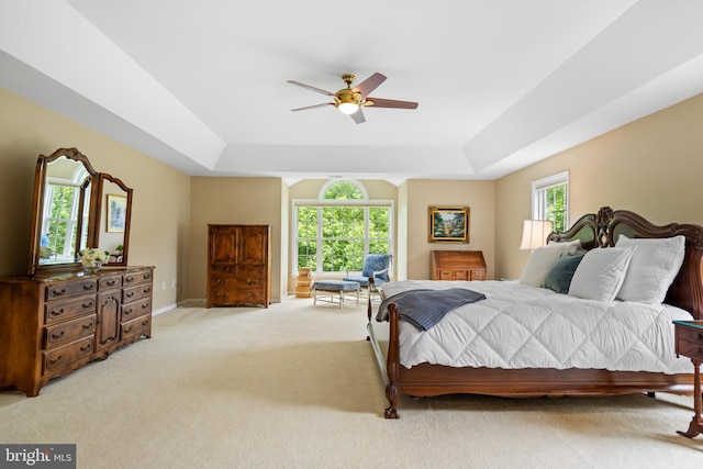 21381 Chickacoan Trail Dr, Broadlands, VA 20148 - bedroom featuring a raised ceiling, carpet flooring, a ceiling fan, and baseboards