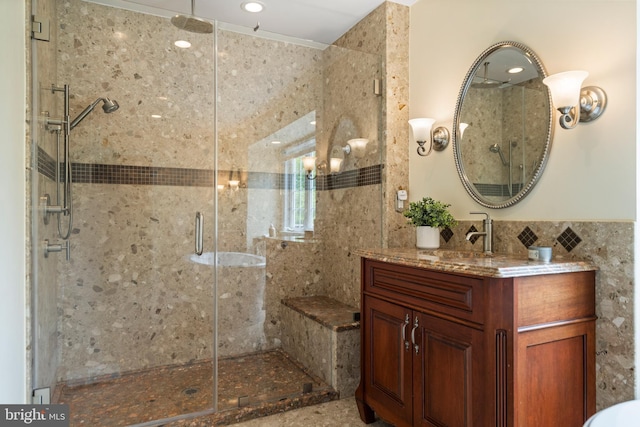 21381 Chickacoan Trail Dr, Broadlands, VA 20148 - full bathroom featuring a shower stall, vanity, and tile walls