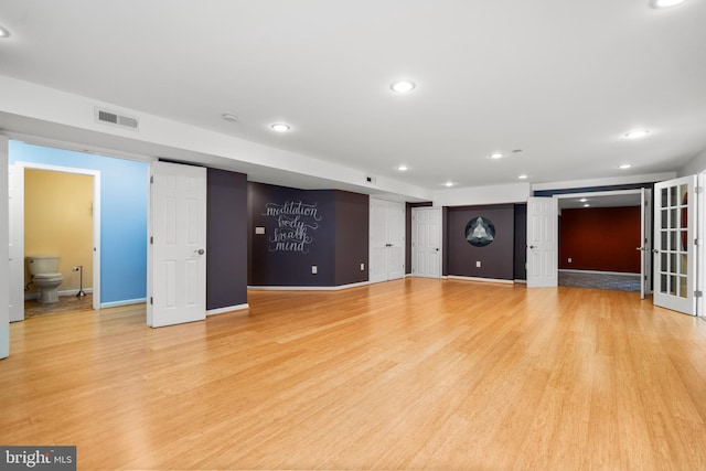 21381 Chickacoan Trail Dr, Broadlands, VA 20148 - unfurnished living room with light wood-type flooring, recessed lighting, and baseboards