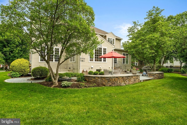 21381 Chickacoan Trail Dr, Broadlands, VA 20148 - rear view of house featuring a patio area