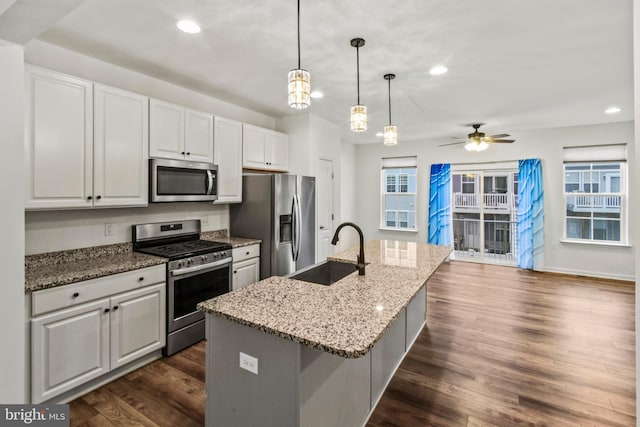 121 Stribling Way, Winchester, VA 22602 - kitchen featuring appliances with stainless steel finishes, a sink, recessed lighting, an island with sink, and white cabinets