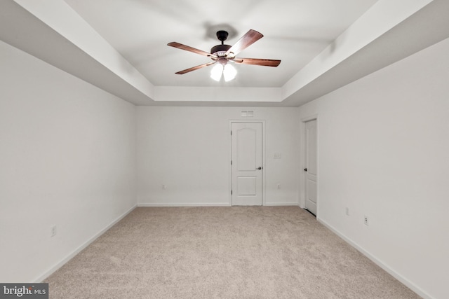 121 Stribling Way, Winchester, VA 22602 - unfurnished room featuring a tray ceiling, light carpet, a ceiling fan, and baseboards