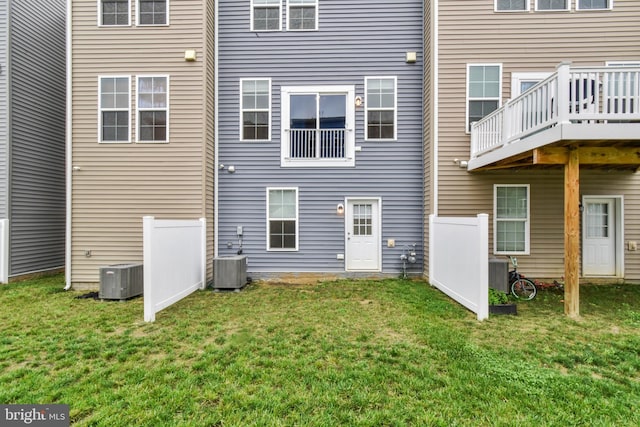 121 Stribling Way, Winchester, VA 22602 - rear view of house featuring cooling unit, a yard, and a deck