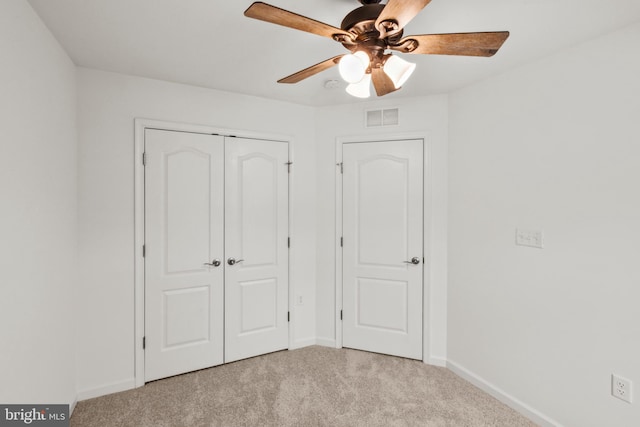 121 Stribling Way, Winchester, VA 22602 - unfurnished bedroom with light carpet, baseboards, a closet, and a ceiling fan