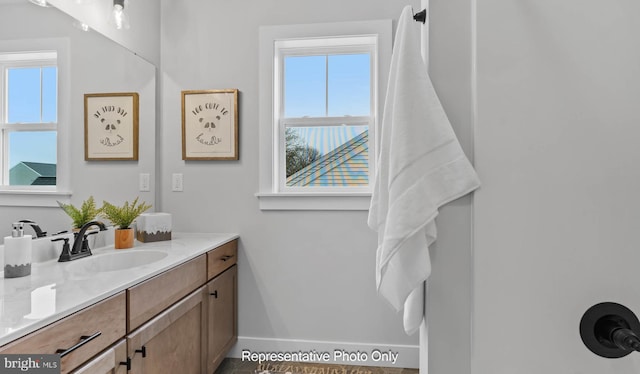 23 Vista Ct, Lititz, PA 17543 - bathroom with plenty of natural light, vanity, and baseboards