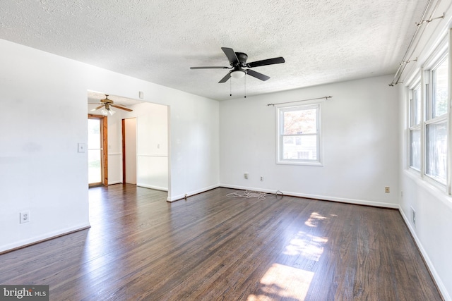 2 Idlewood St, Glen Burnie, MD 21061 - empty room with a ceiling fan, dark wood finished floors, a textured ceiling, and baseboards