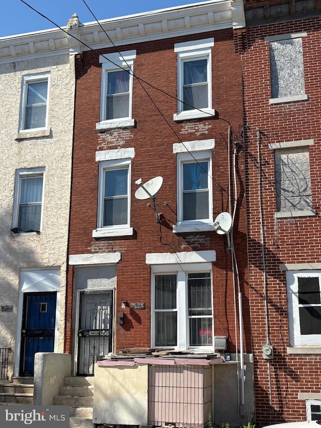 2021 W Westmoreland St, Philadelphia, PA 19140 - townhome / multi-family property with brick siding