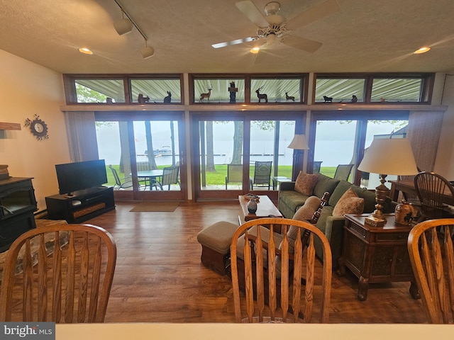 939 Glendale Rd Unit 13, Oakland, MD 21550 - living area featuring wood finished floors, ceiling fan, and track lighting