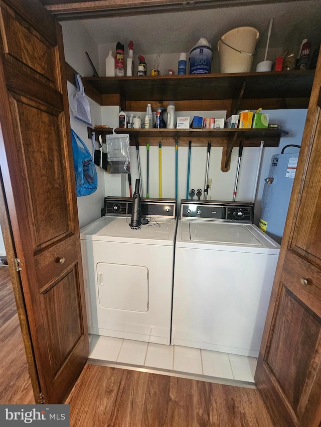 939 Glendale Rd Unit 13, Oakland, MD 21550 - laundry room featuring washing machine and dryer and wood finished floors