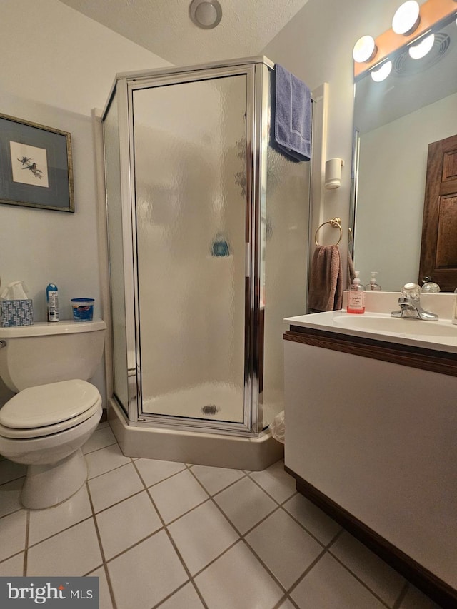 939 Glendale Rd Unit 13, Oakland, MD 21550 - bathroom with vanity, a stall shower, tile patterned floors, and toilet