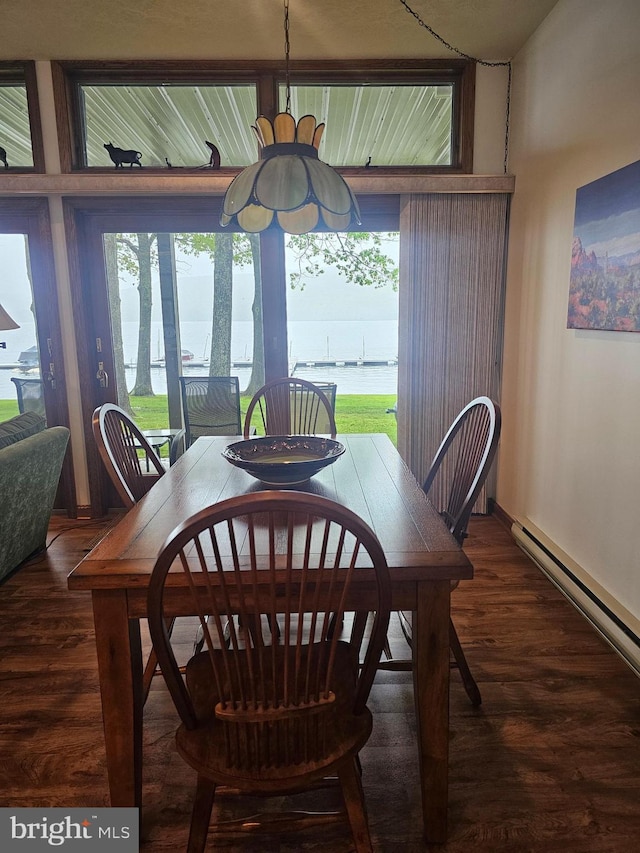 939 Glendale Rd Unit 13, Oakland, MD 21550 - dining area featuring wood finished floors and baseboard heating