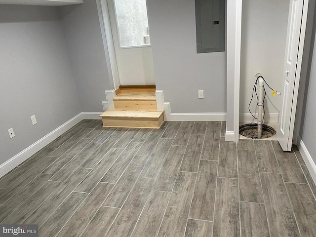 217 S E Ave S, Baltimore, MD 21224 - interior space featuring electric panel, dark wood-style floors, and baseboards