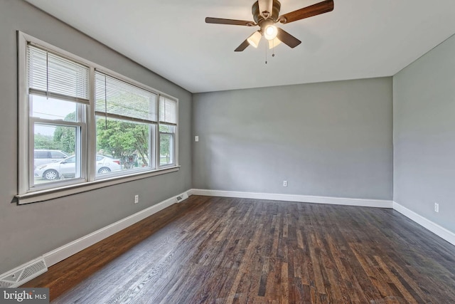 3176 S Hance Bridge Rd, Vineland, NJ 08361 - empty room with dark wood finished floors, baseboards, and a ceiling fan