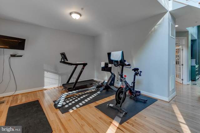 3565 Sauvignon Ln, Chesapeake Beach, MD 20732 - workout area featuring wood finished floors and baseboards