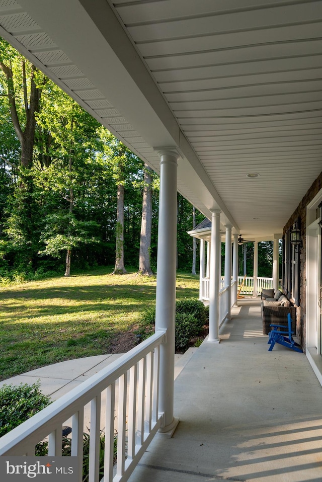3565 Sauvignon Ln, Chesapeake Beach, MD 20732 - covered porch with a lawn