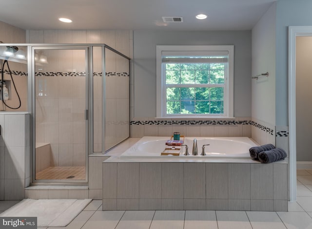 3565 Sauvignon Ln, Chesapeake Beach, MD 20732 - bathroom featuring a garden tub, a shower stall, tile patterned floors, and recessed lighting