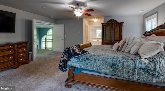 3565 Sauvignon Ln, Chesapeake Beach, MD 20732 - bedroom featuring carpet, multiple windows, ceiling fan, and ensuite bathroom