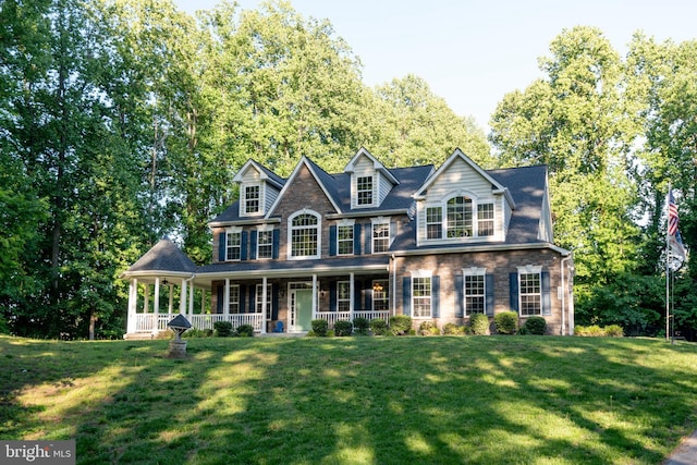 3565 Sauvignon Ln, Chesapeake Beach, MD 20732 - colonial house with a porch and a front yard